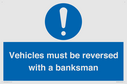 vehicles-must-be-reversed-with-a-banksman~